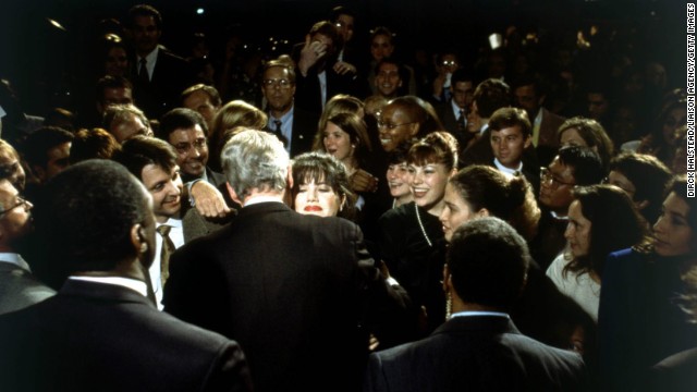 White House intern Monica Lewinsky embraces President Clinton at a Democratic fund-raiser in Washington on October 23, 1996.