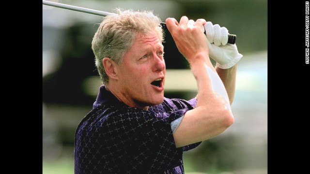 Clinton tees off on the first hole at Farm Neck Golf Club during a visit to Martha's Vineyard in Massachusetts on August 22, 1997.