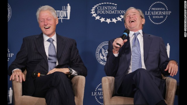 Former Presidents Clinton and George W. Bush share a laugh during an event launching the Presidential Leadership Scholars program at the Newseum in Washington on September 8, 2014. With the cooperation of the Clinton, Bush, Lyndon B. Johnson and George H. W. Bush presidential libraries and foundations, the new scholarship program will provide "motivated leaders across all sectors an opportunity to study presidential leadership and decision making and learn from key administration officials, practitioners and leading academics."