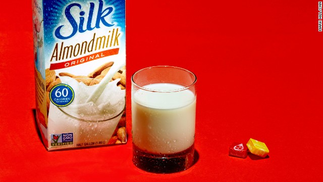 Milk: Silk Almond Milk Original. A glass of original almond milk contains 7 grams of sugar. Unsweetened almond milk has 0 grams. 