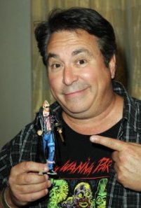 Brian Peck, aka Scuz, with his own action figure. Cool!