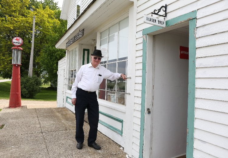 Vernon Winterhof, chairman of Hanover, stands outside of one of the historic buildings that make up the tiny town of Hanover, west of Storm Lake. The rich Iowa farm history will give RAGBRAI riders a peak at what life was like in the early 20th century.