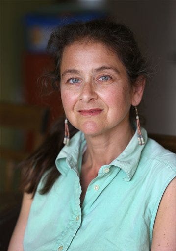 In this Nov 27, 2015 photo, U.S. activist Lori Berenson, poses for a portrait in her home in Lima, Peru. Berenson is heading home to New York,  two decades after being found guilty of aiding leftist rebels. The 46-year-old has been living quietly in Lima with her 6-year-old son since her 2010 parole. She’s been barred from leaving the country until her 20-year sentence lapsed. (AP Photo/Martin Mejia)