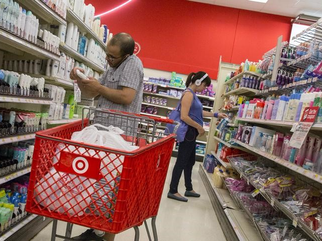 Customers shop in the pharmacy department of a Target store in the Brooklyn borough of New York June 15, 2015.  REUTERS/Brendan McDermid 