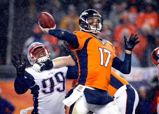 Denver Broncos quarterback Brock Osweiler (17) throws against the New England Patriots during the second half of an NFL football game, Sunday, Nov. 29, 2015, in Denver. The Broncos won 30-24.(AP Photo/Joe Mahoney)