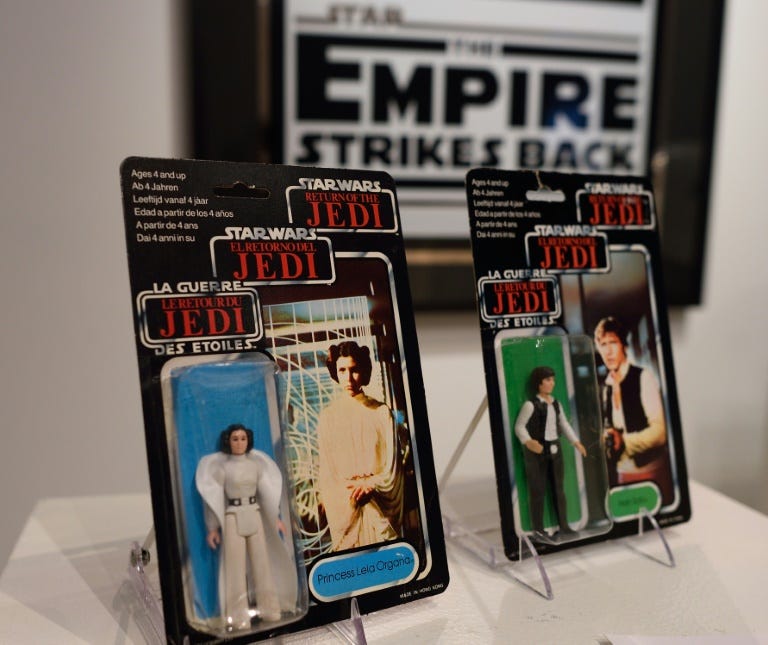 A Star Wars Princess Leia and Han Solo action figures are among the items of “Star Wars” collectibles: “Return of the NIGO” displayed during a press preview at Sotheby's on December 2, 2015 in New York