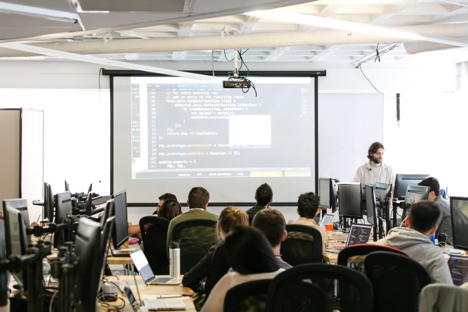 Students learning software development at Fullstack Academy in New York.