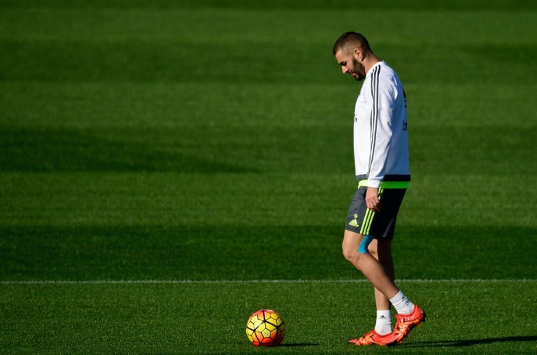Real Madrid's French forward Karim Benzema, pictured on November 7, 2015, has been charged with complicity to blackmail and conspiring to commit a criminal act