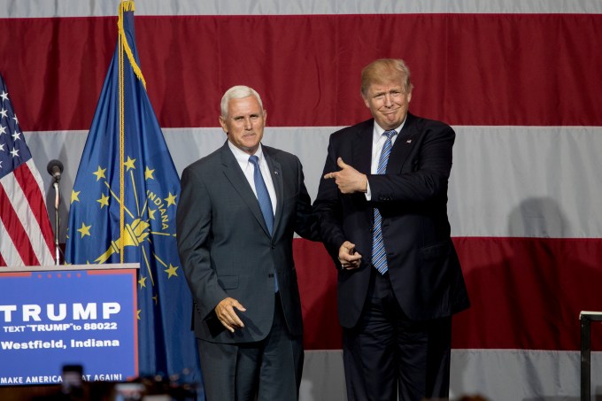 WESTFIELD, IN - JULY 12:   Republican presidential candidate Donald Trump greets Indiana Gov. Mike Pence at the Grand Park Events Center on July 12, 2016 in Westfield, Indiana. Trump is campaigning amid speculation he may select Indiana Gov. Mike Pence as his running mate. (Photo by Aaron P. Bernstein/Getty Images)