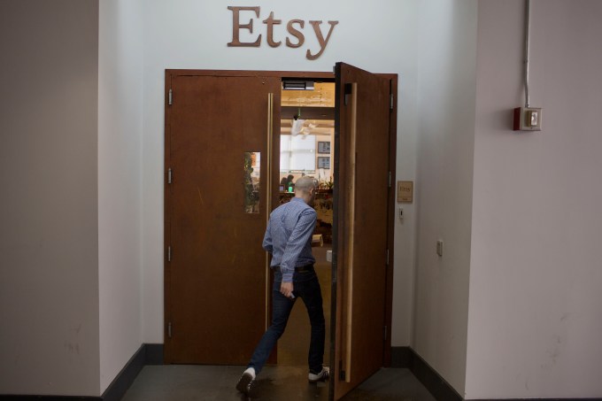 An employee arrives at Etsy Inc. headquarters in the Brooklyn borough of New York, U.S., on Monday, May 4, 2015. Etsy Inc., a marketplace for handmade and vintage goods, raised $267 million in its initial public offering. Photographer: Victor J. Blue/Bloomberg via Getty Images