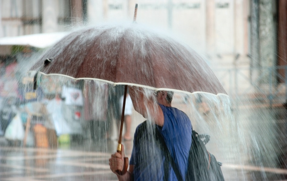 Umbrella in heavy rain